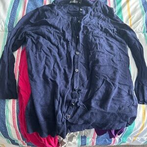4 3/4 sleeve cardigans. Maybe worn once. Navy, purple, pink, and grey.